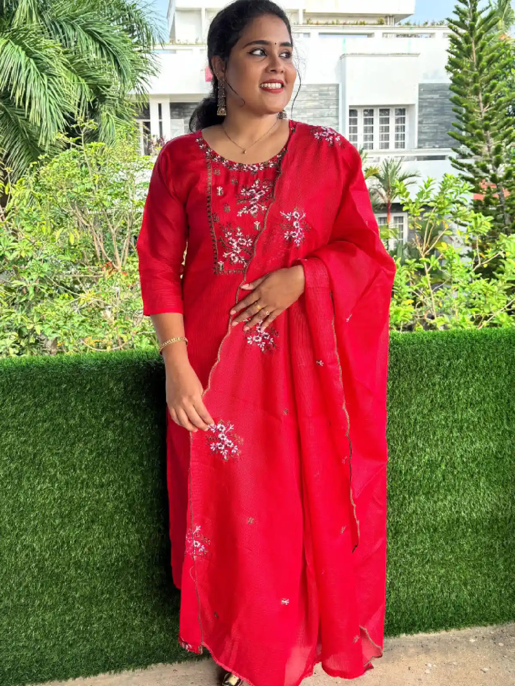 Elegant salwar suit in Netkota fabric with floral thread embroidary works.